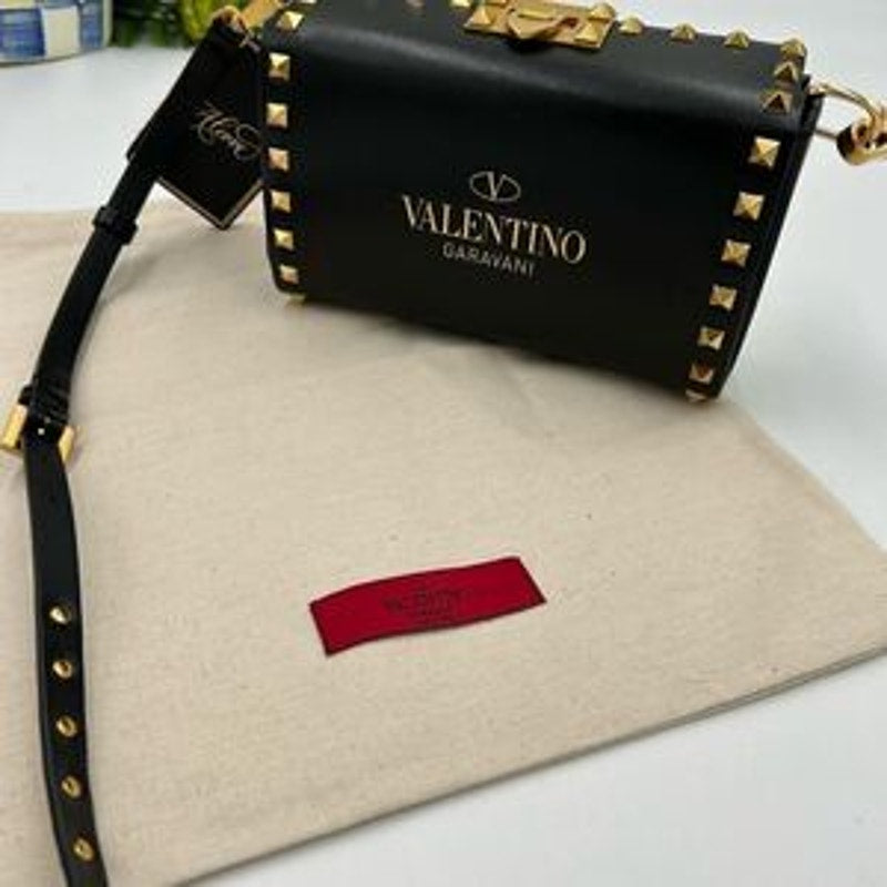 Women’s Valentino Garavani rock, stud, leather shoulder bag made in Italy