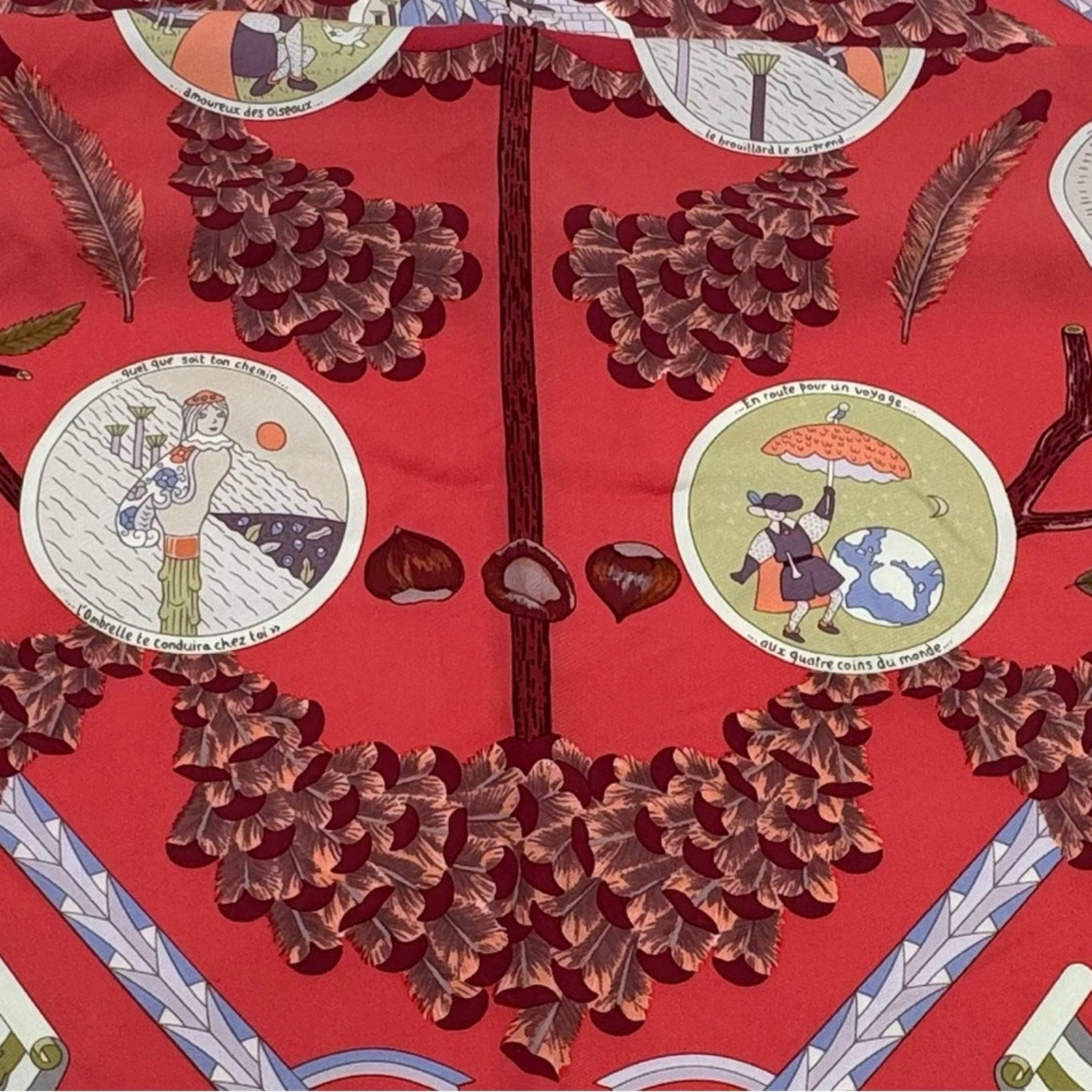 Hermes, silk scarf. The theme is the magic umbrella, coral colorway w/vignettes.