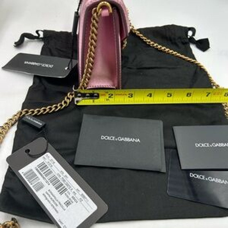 Women's Dolce & Gabanna pink leather top handle bejeweled bag made in Italy