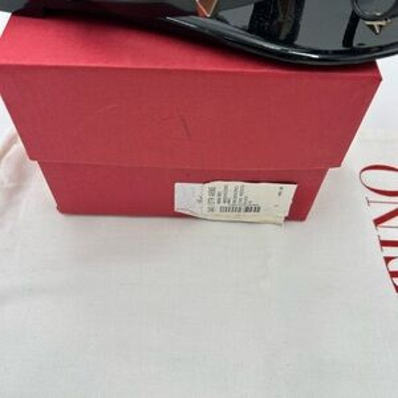 Women's Valentino, Garavani rock, stud, thong sandals with pyramid studs size 36