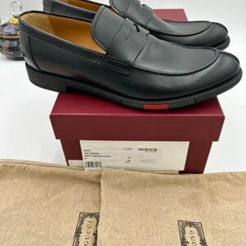 Men's Gucci, leather strap penny loafer with web detail size 6.5 fits 7.5 US