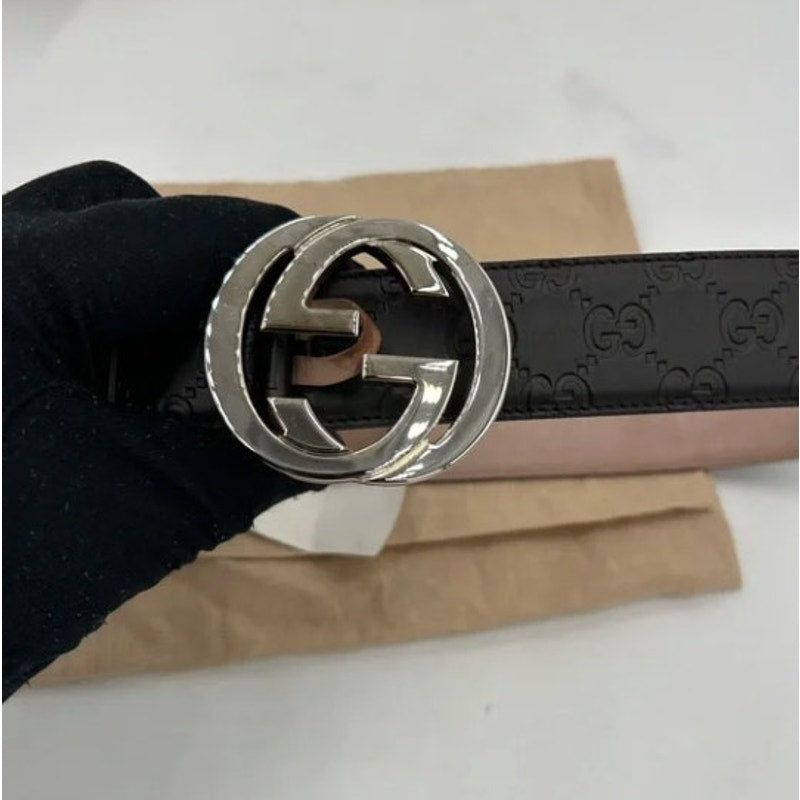 Men's Gucci signature leather embossed interlocking G buckle belt size 38/95 cm