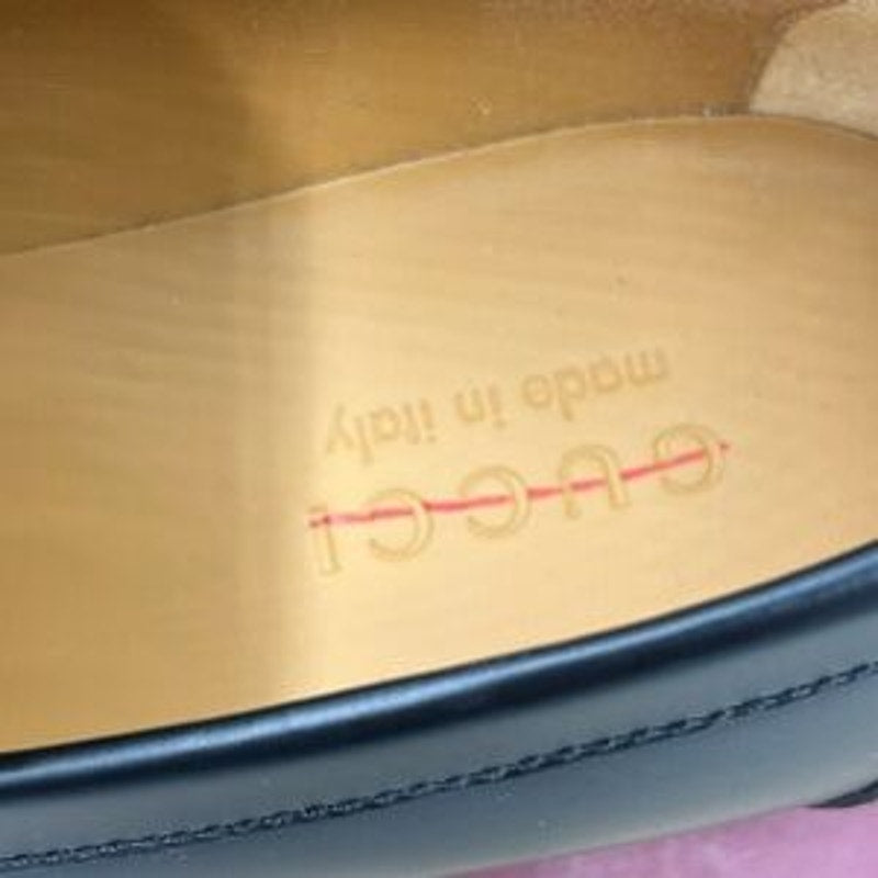 Men's Gucci, leather strap penny loafer with web detail size 6.5 fits 7.5 US