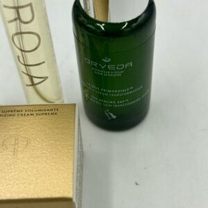 Women's gift bag,Cleau de Peau,Orvida serum , Roja perfume,Revive eye mask