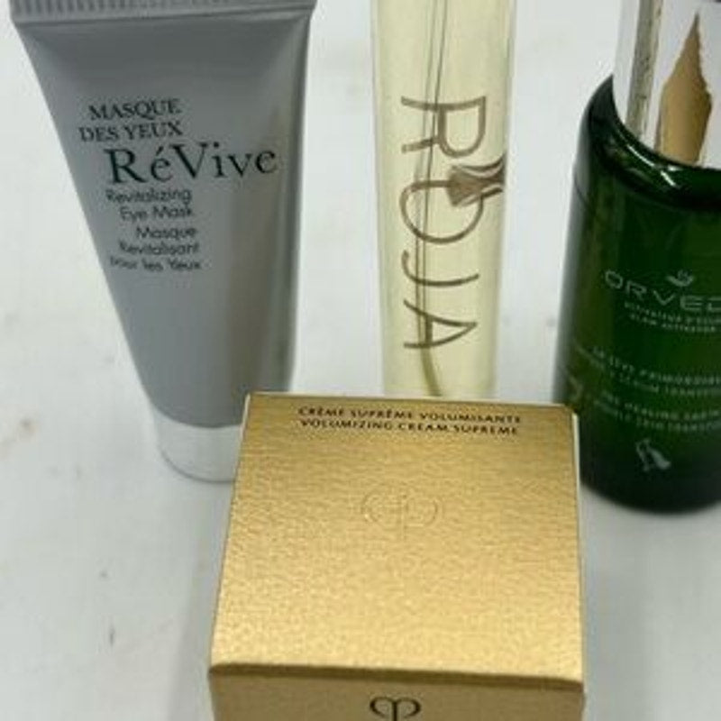 Women's gift bag,Cleau de Peau,Orvida serum , Roja perfume,Revive eye mask