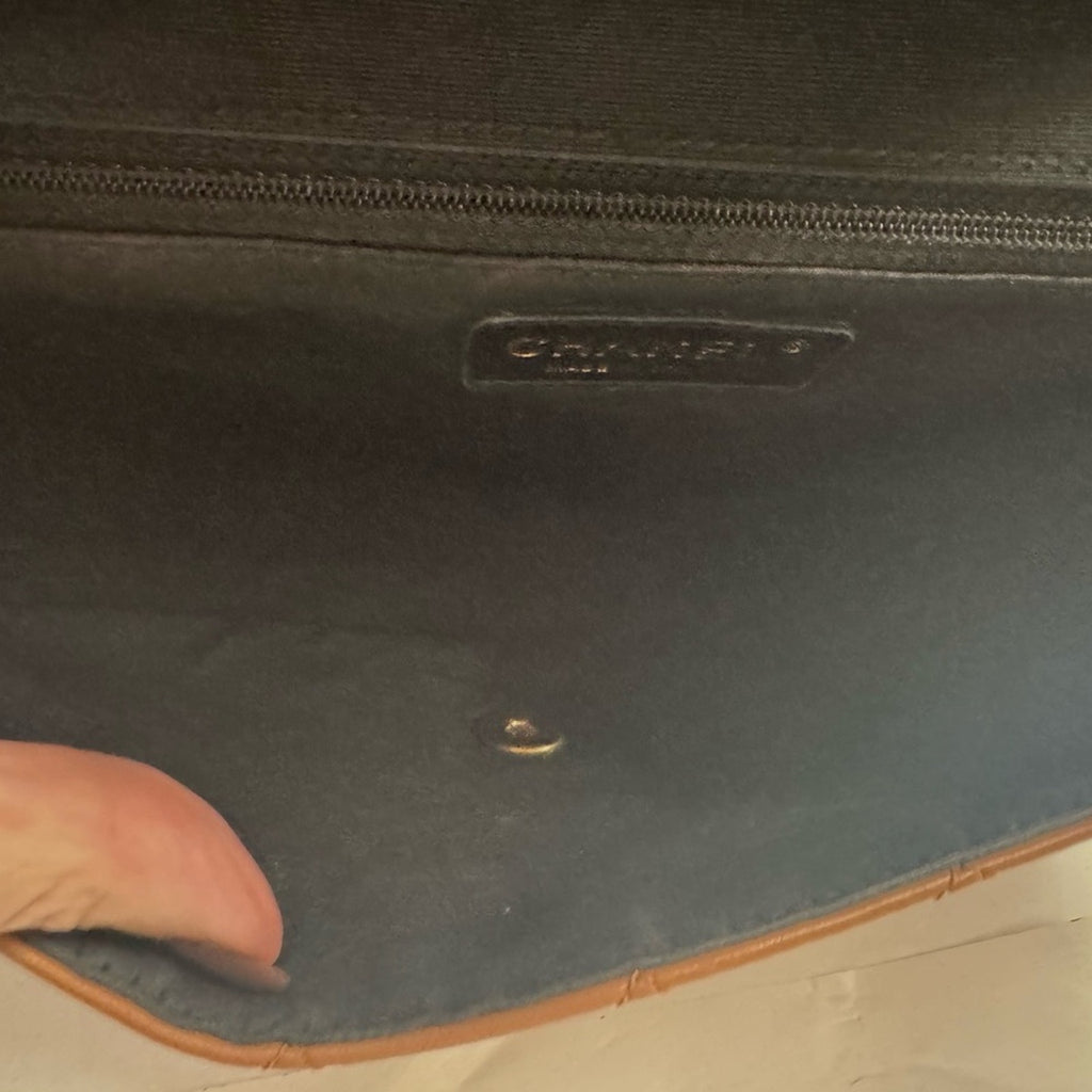 Chanel Black and Tan flap bag with gold hardware/adjustable strap/back pocket