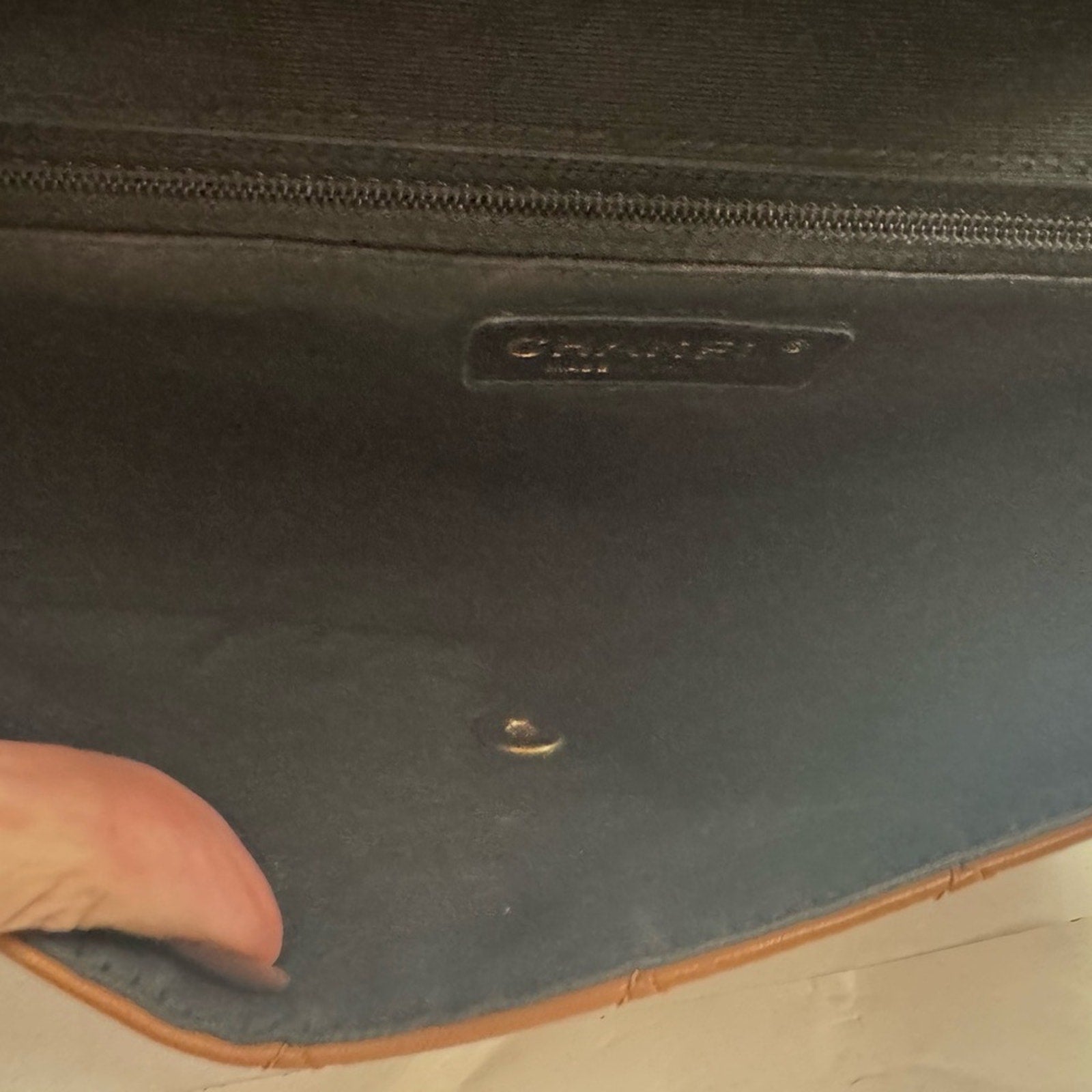 Chanel Black and Tan flap bag with gold hardware/adjustable strap/back pocket