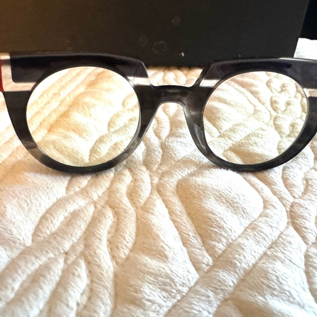 Anne & Valentin custom frames hand crafted in France 
Eyeglass Art Red Black