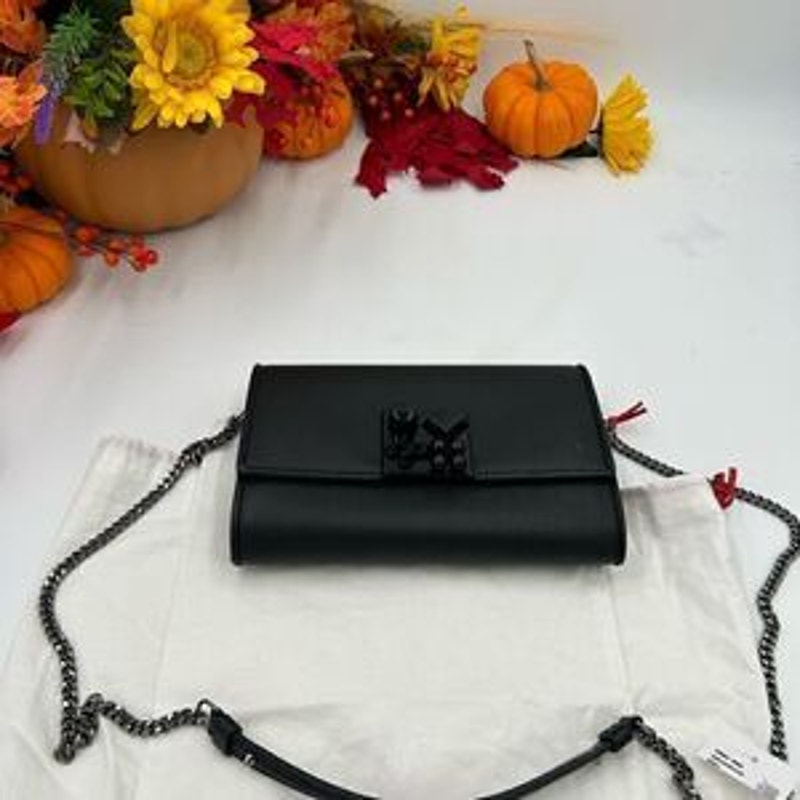 Christian Louboutin,Carasky leather clutch/shoulder bag made in Italy