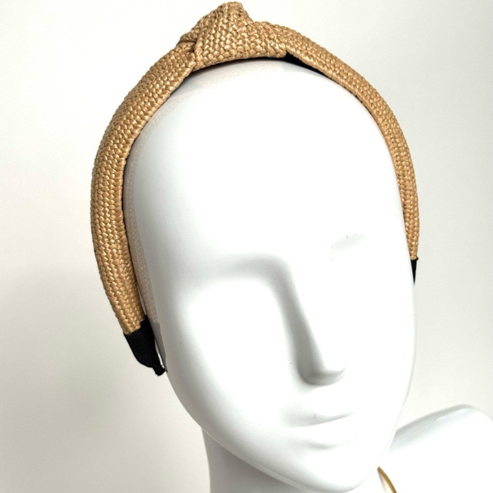 Women’s rare Eugenia Kim Rafia, knot headband
Purchased at Henry Bendel/Like New
