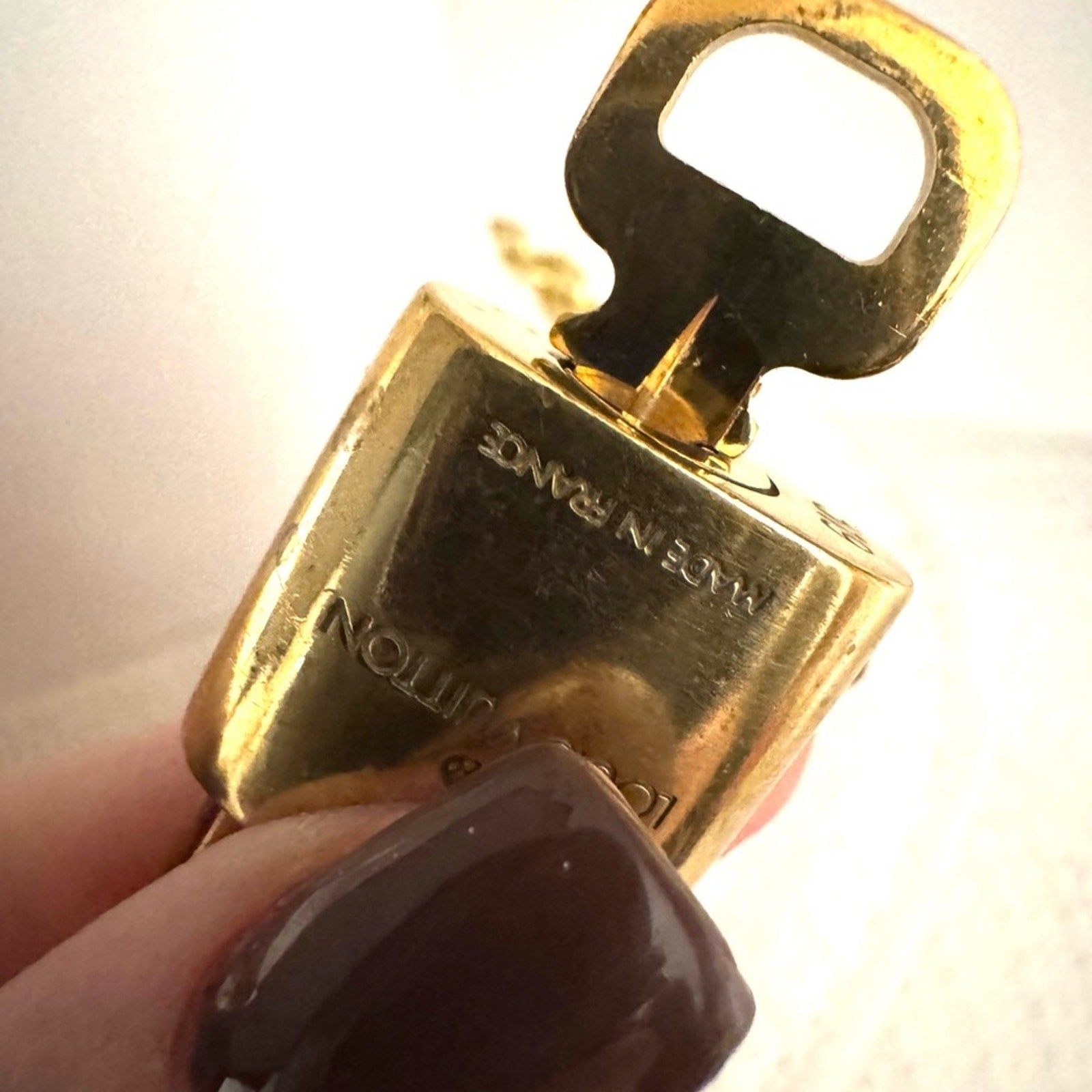 Louis Vuitton Gold Padlock #319 with LV branded chain that can be purse chain