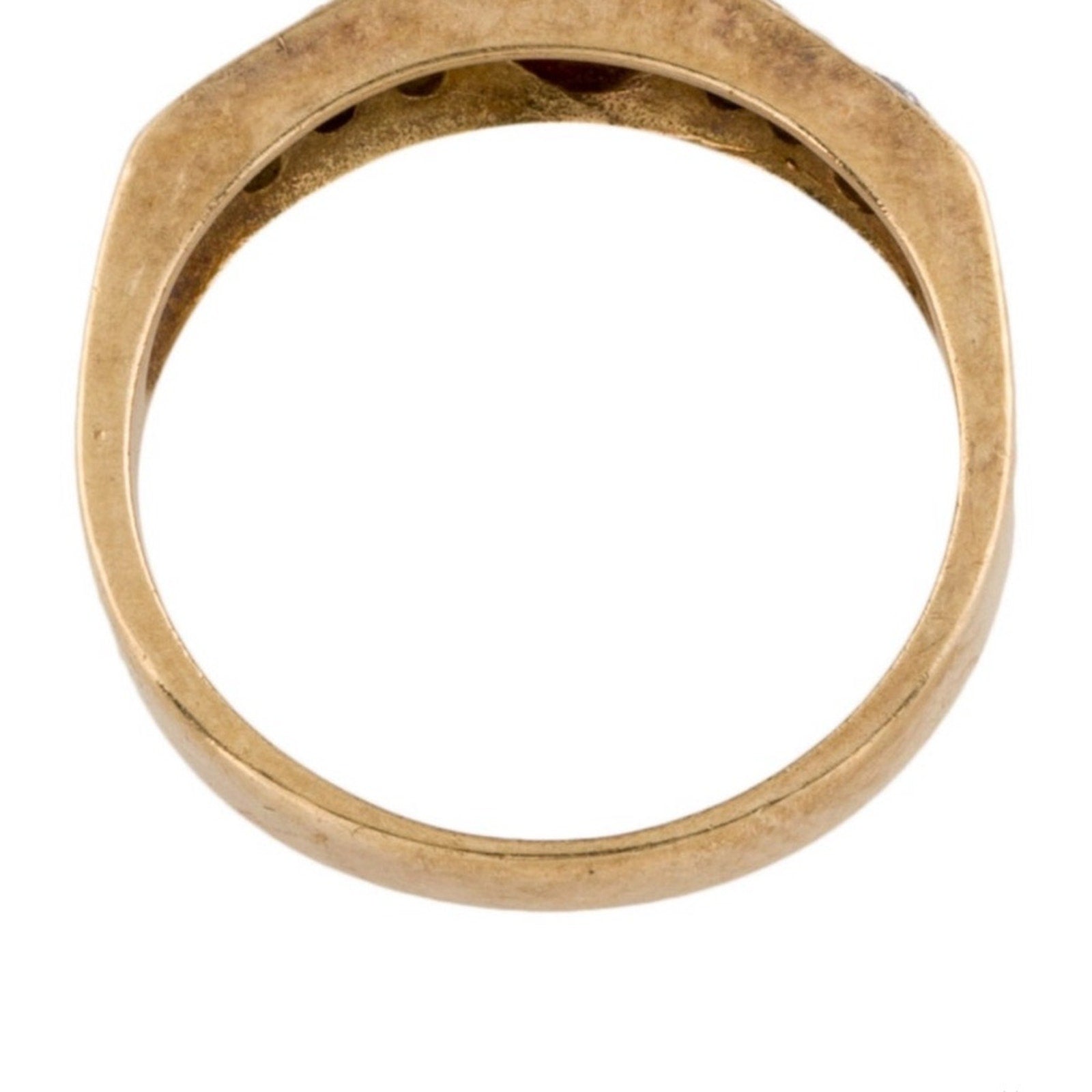 Cabochon Ruby ring set with diamond stones set in an 18 karat gold band