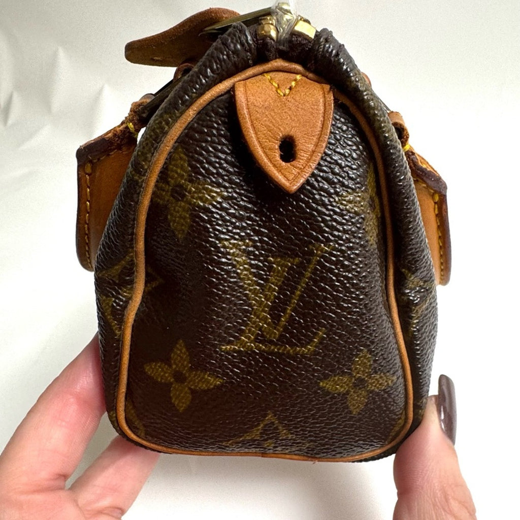 Louis Vuitton Monogram Mini Speedy HL
Replacement tab, branded rivet, Very Clean