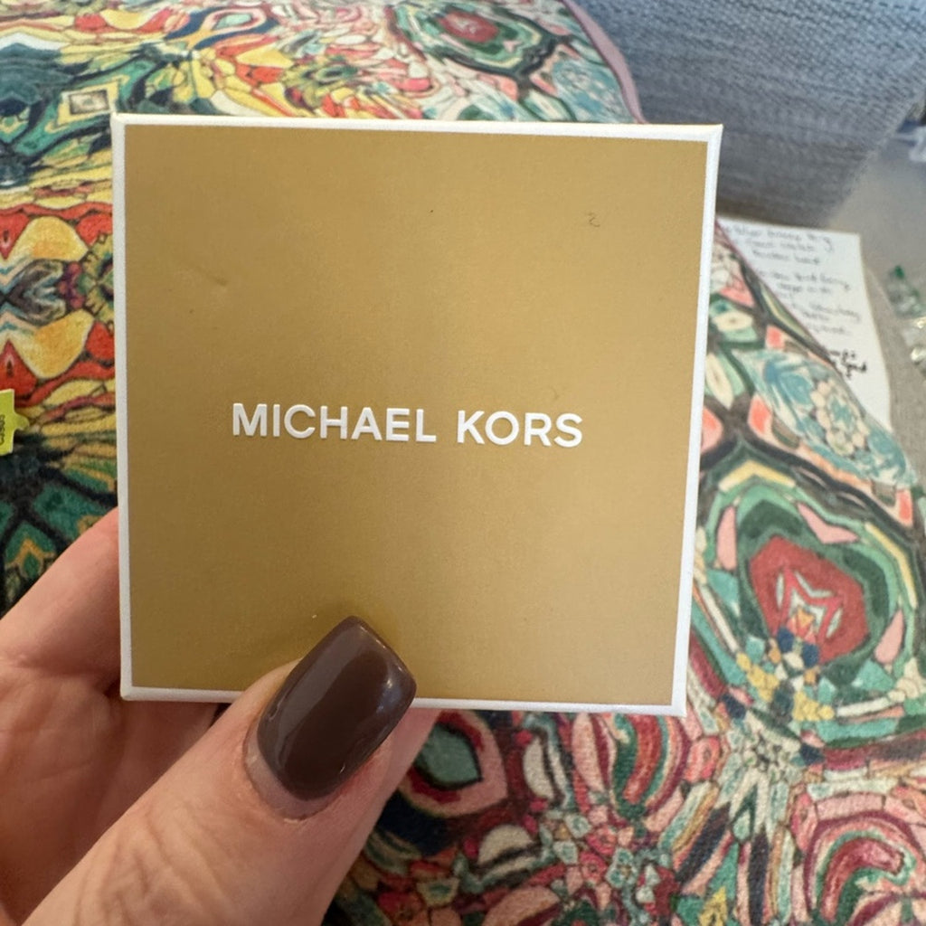 Michael Kors Gold Plated ring NIB  logo plaque riveted onto smaller band size 8