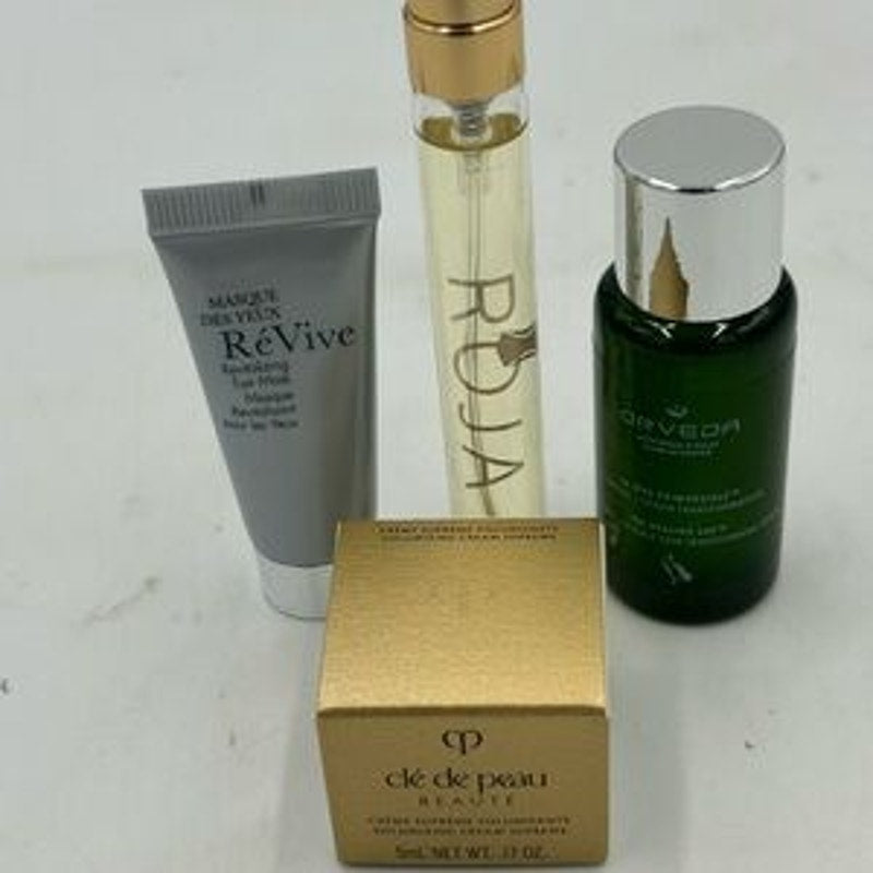 Women's gift bag,Cleau de Peau,Orvida serum , Roja perfume,Revive eye mask