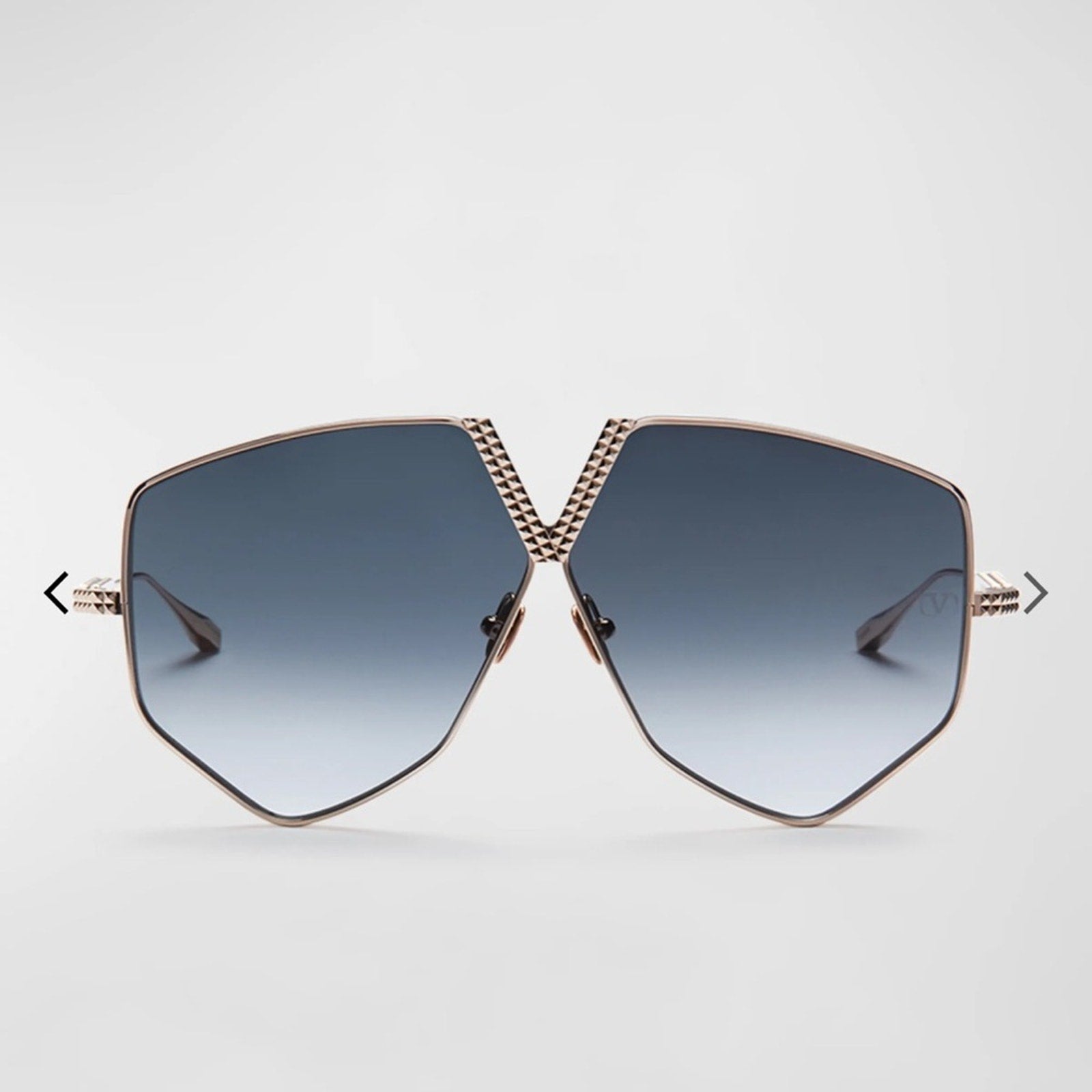 VALENTINO GARAVANI
V-Hexagon Titanium Sunglasses
Branded/crossbody bag included