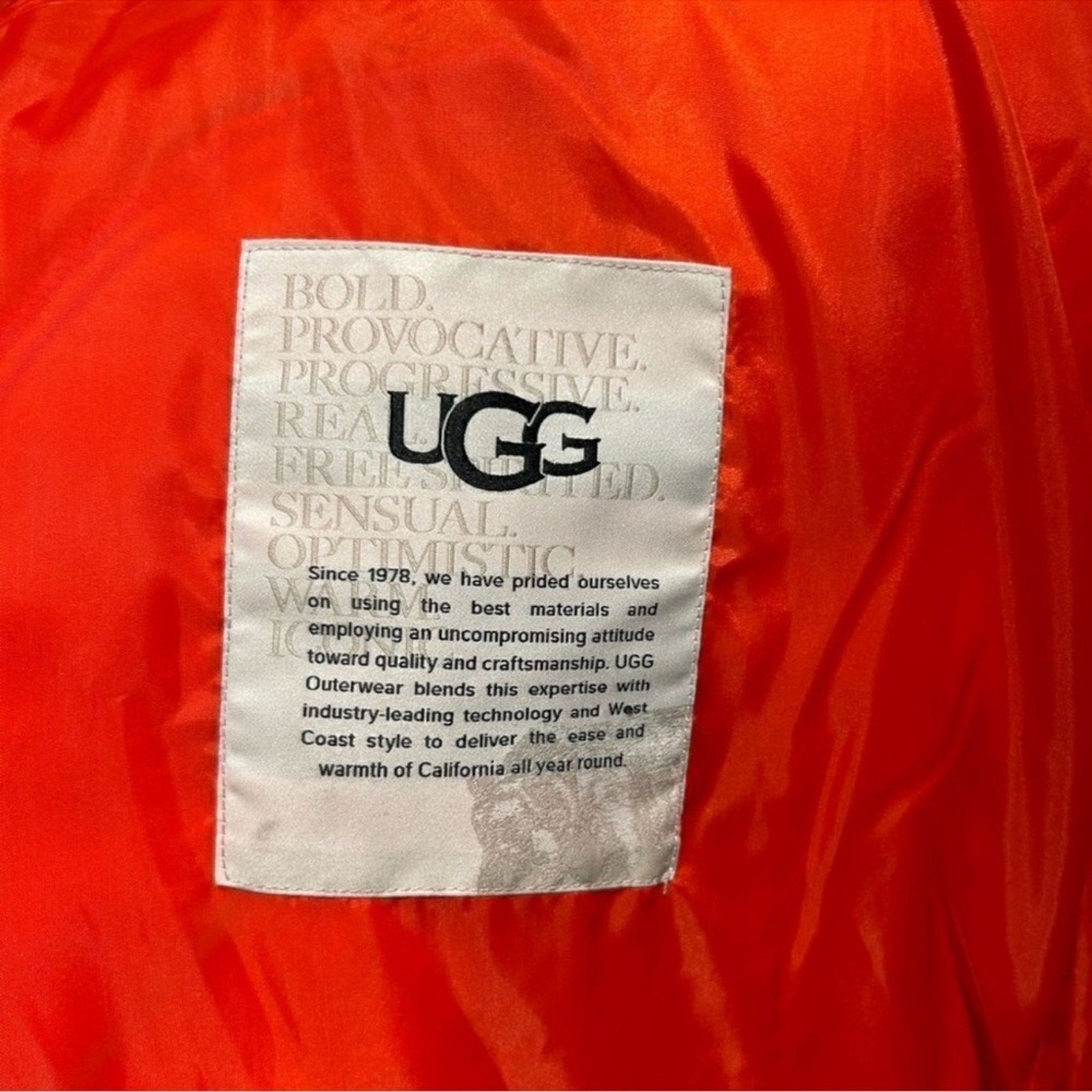 Women's UGG water resistant red puffer jacket, size Large
New With Tags