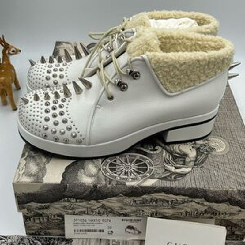 Women’s Gucci spiked shearling lined ankle boots size 39 made in Italy