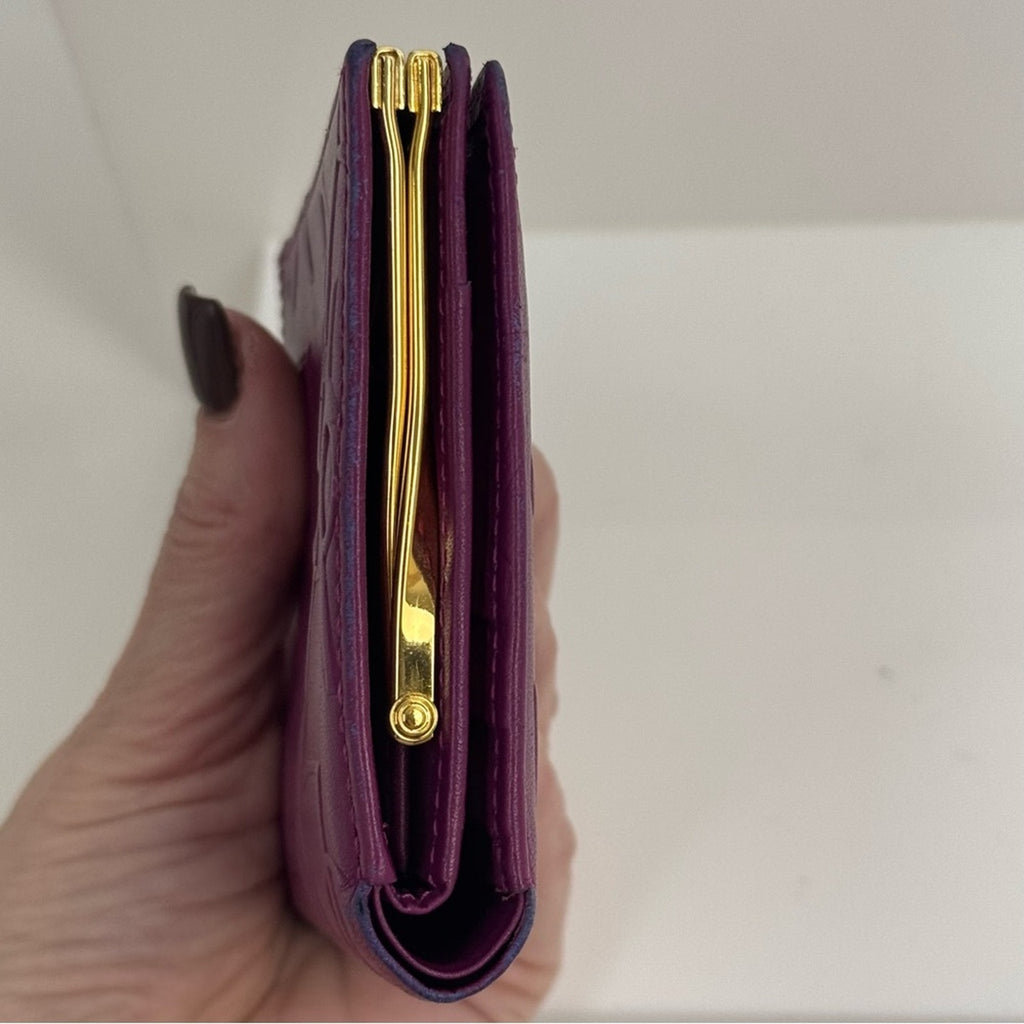 Yves Saint Laurent Purple Small Women's Wallet with decorative kiss lock snap