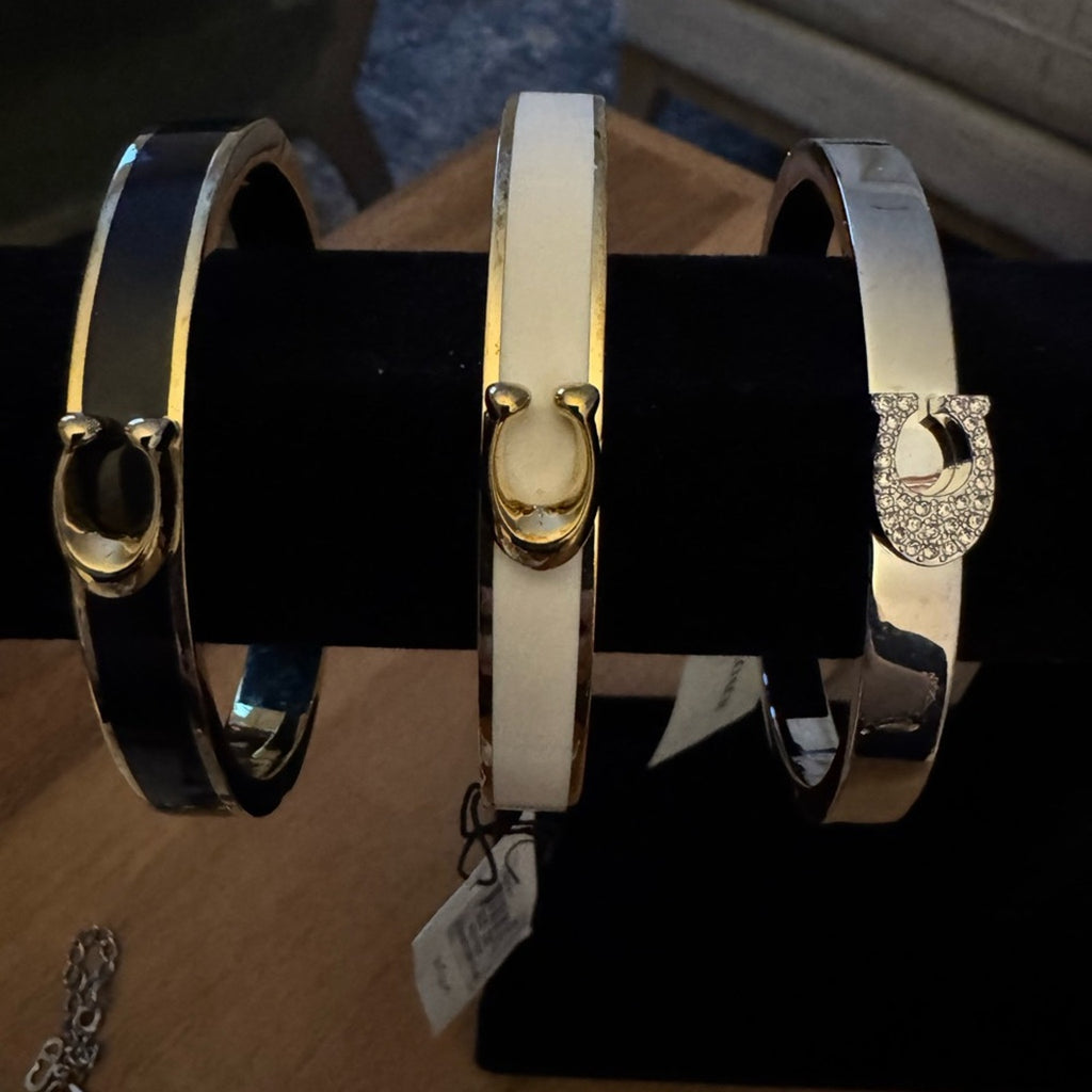 6 Coach NWT’s(each $98)& a bonus Chanel style cuff also NWT’s bundle price $399