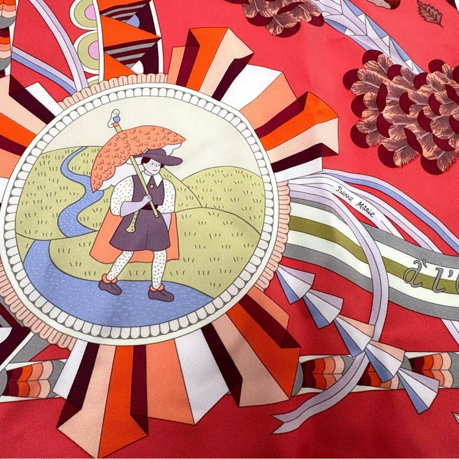 Hermes, silk scarf. The theme is the magic umbrella, coral colorway w/vignettes.