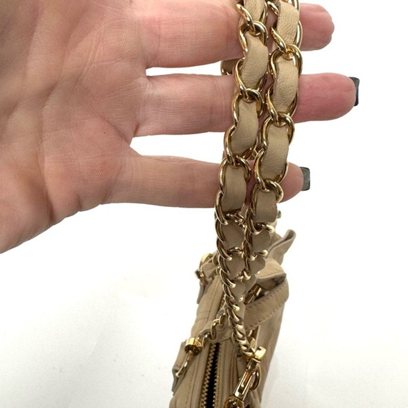 Dolce and Gabbana miniature leather bag with kiss lock, plaque and gold hardware