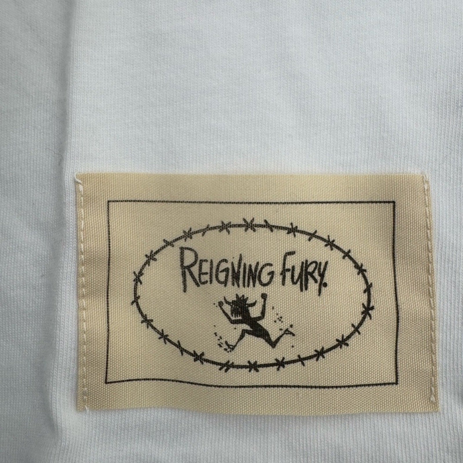 Men’s Reigning Fury-Blue Ghost of Trucker T White
Size L, limited edition NWT’s