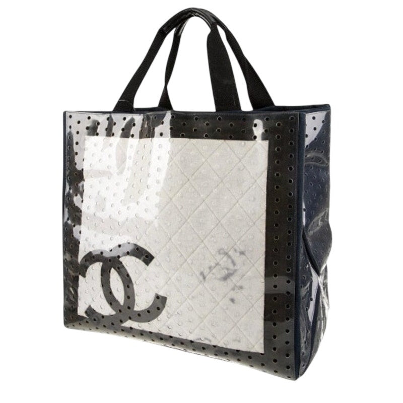 Chanel ENORMOUS tote, black + white fabric w/perforated pvc layer over material
