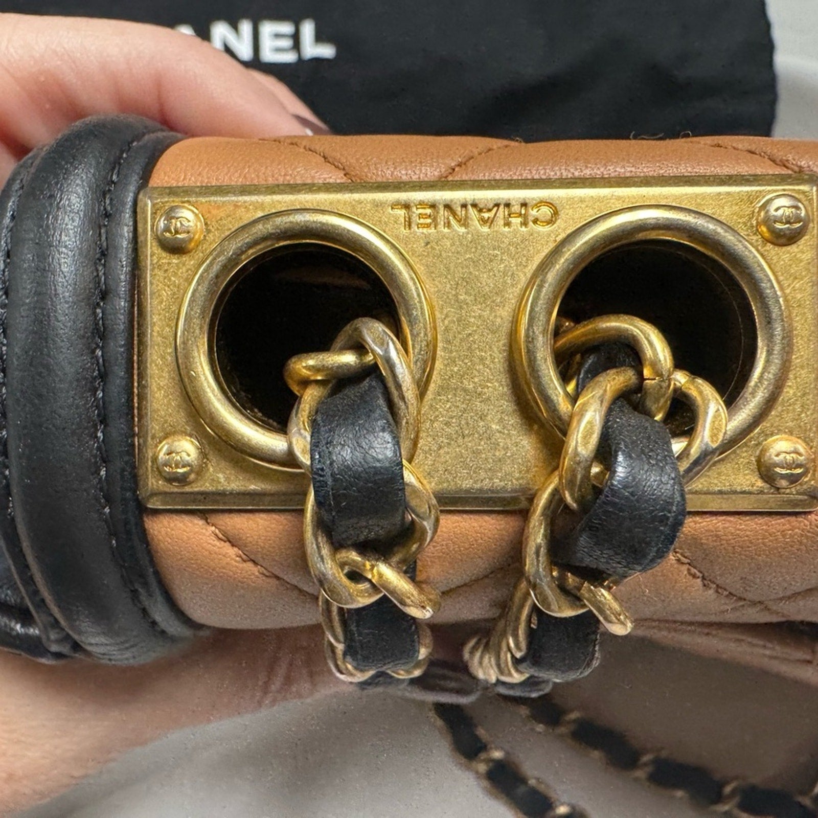 Chanel Black and Tan flap bag with gold hardware/adjustable strap/back pocket