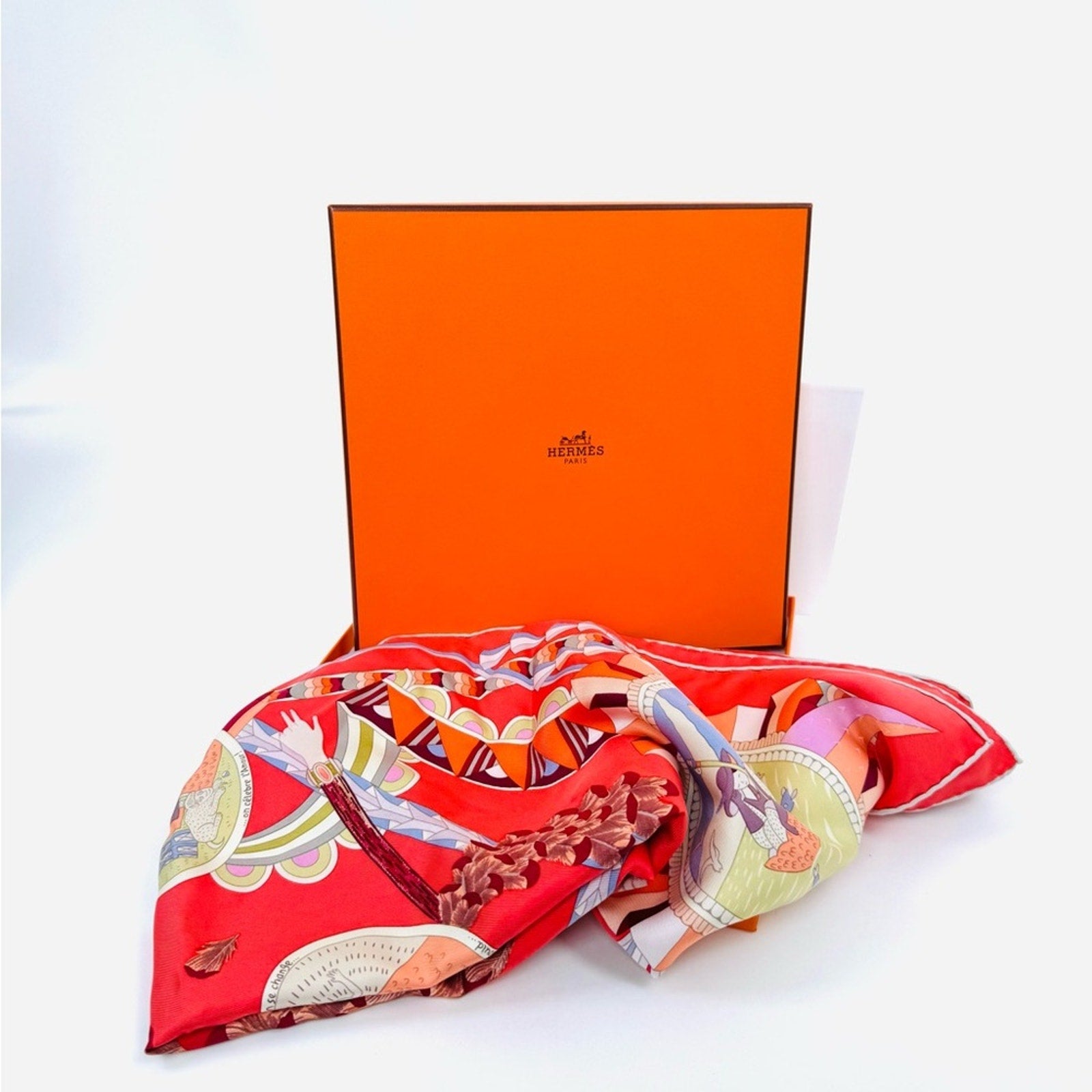 Hermes, silk scarf. The theme is the magic umbrella, coral colorway w/vignettes.
