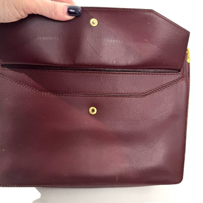 Cartier Burgundy Wristlet pouch with exterior front pocket w/interior peeling