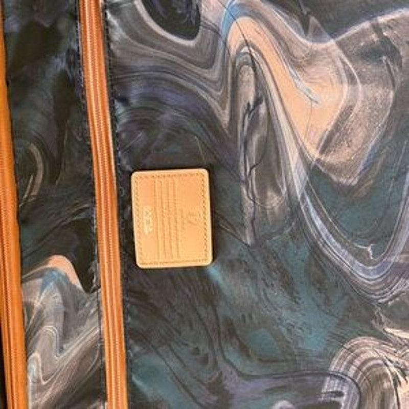 Tumi 19° extended trip expandable four-wheel packing suitcase NWT