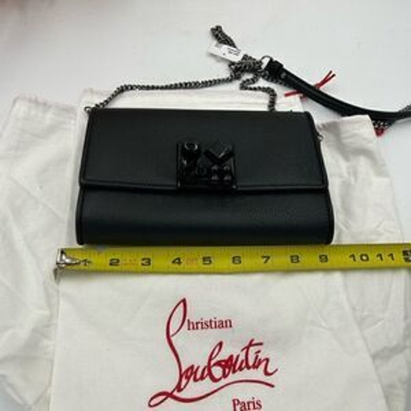 Christian Louboutin,Carasky leather clutch/shoulder bag made in Italy