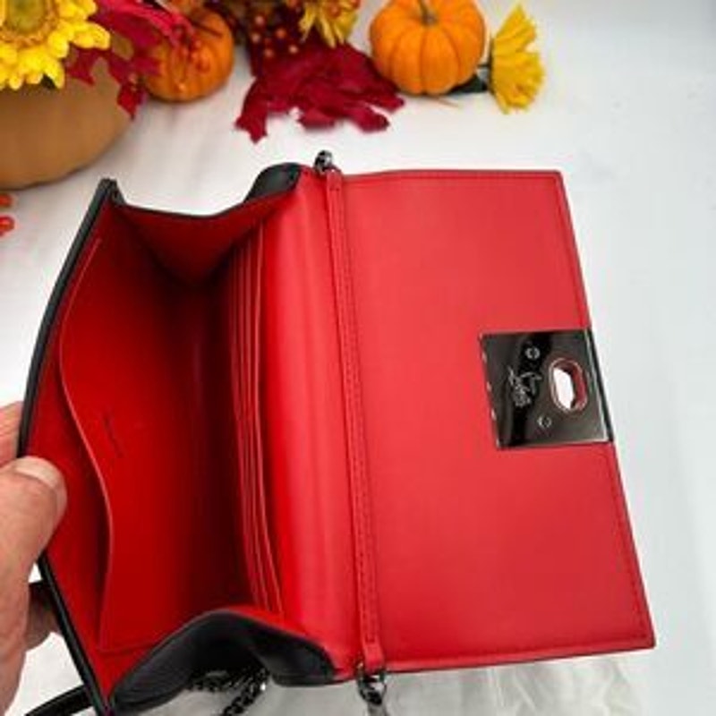 Christian Louboutin,Carasky leather clutch/shoulder bag made in Italy