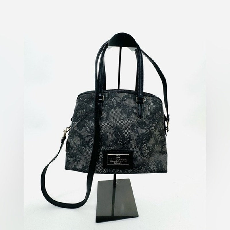 Valentino Garavani Black Lace Top Handle Bag with 3 sections and gold feet