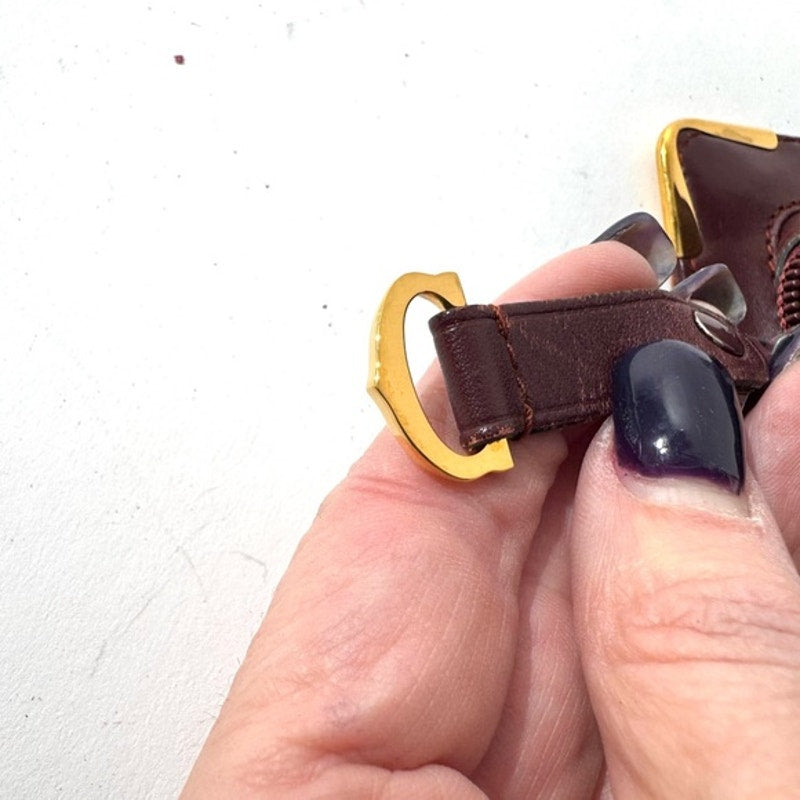 Cartier Burgundy Wristlet pouch with exterior front pocket w/interior peeling