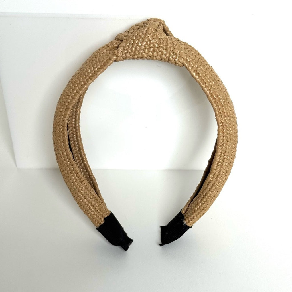Women’s rare Eugenia Kim Rafia, knot headband
Purchased at Henry Bendel/Like New