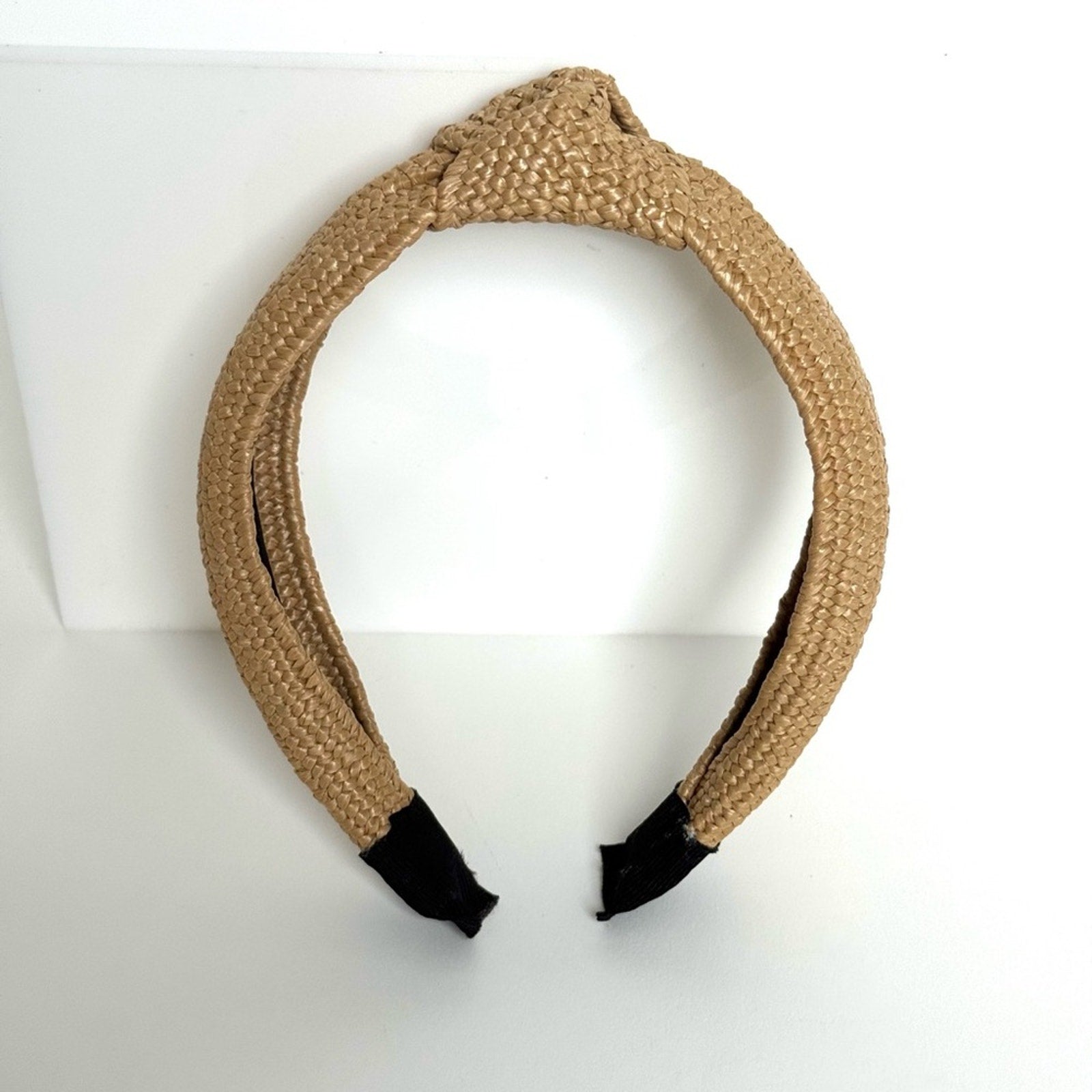 Women’s rare Eugenia Kim Rafia, knot headband
Purchased at Henry Bendel/Like New