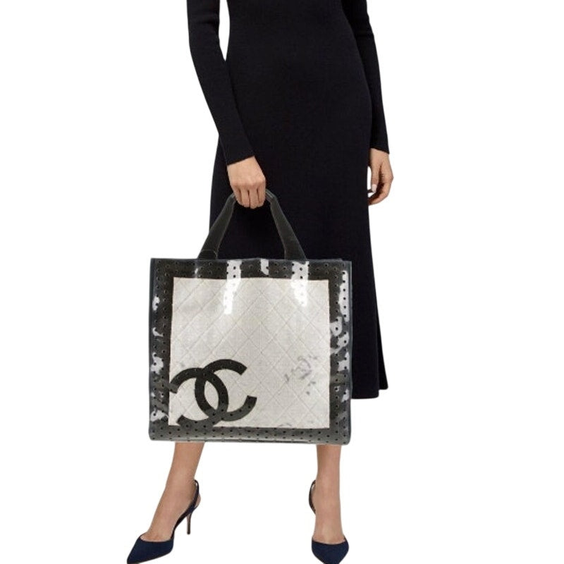 Chanel ENORMOUS tote, black + white fabric w/perforated pvc layer over material