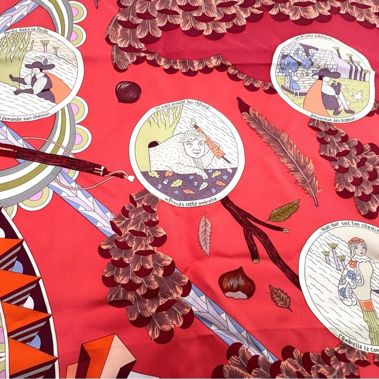 Hermes, silk scarf. The theme is the magic umbrella, coral colorway w/vignettes.