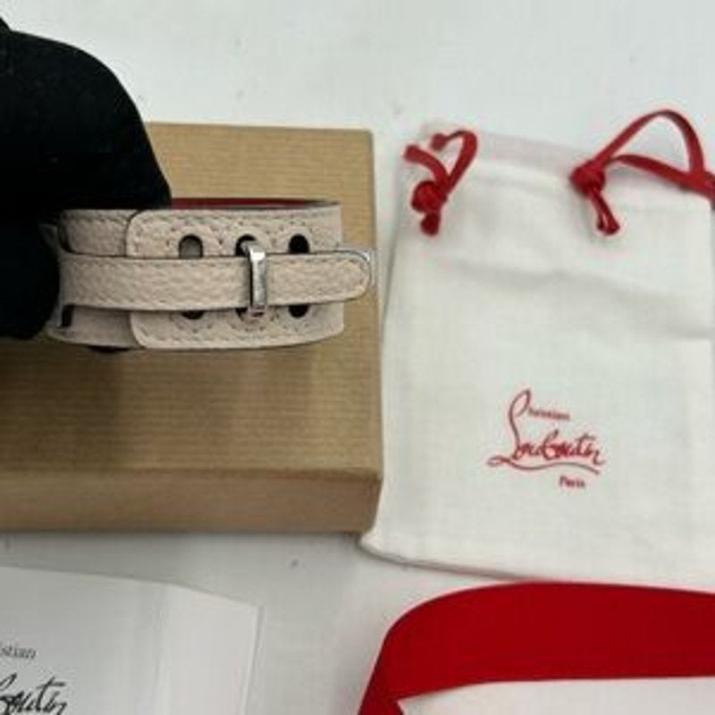 Christian Louboutin Paloma spike embellished leather bracelet. NWT.