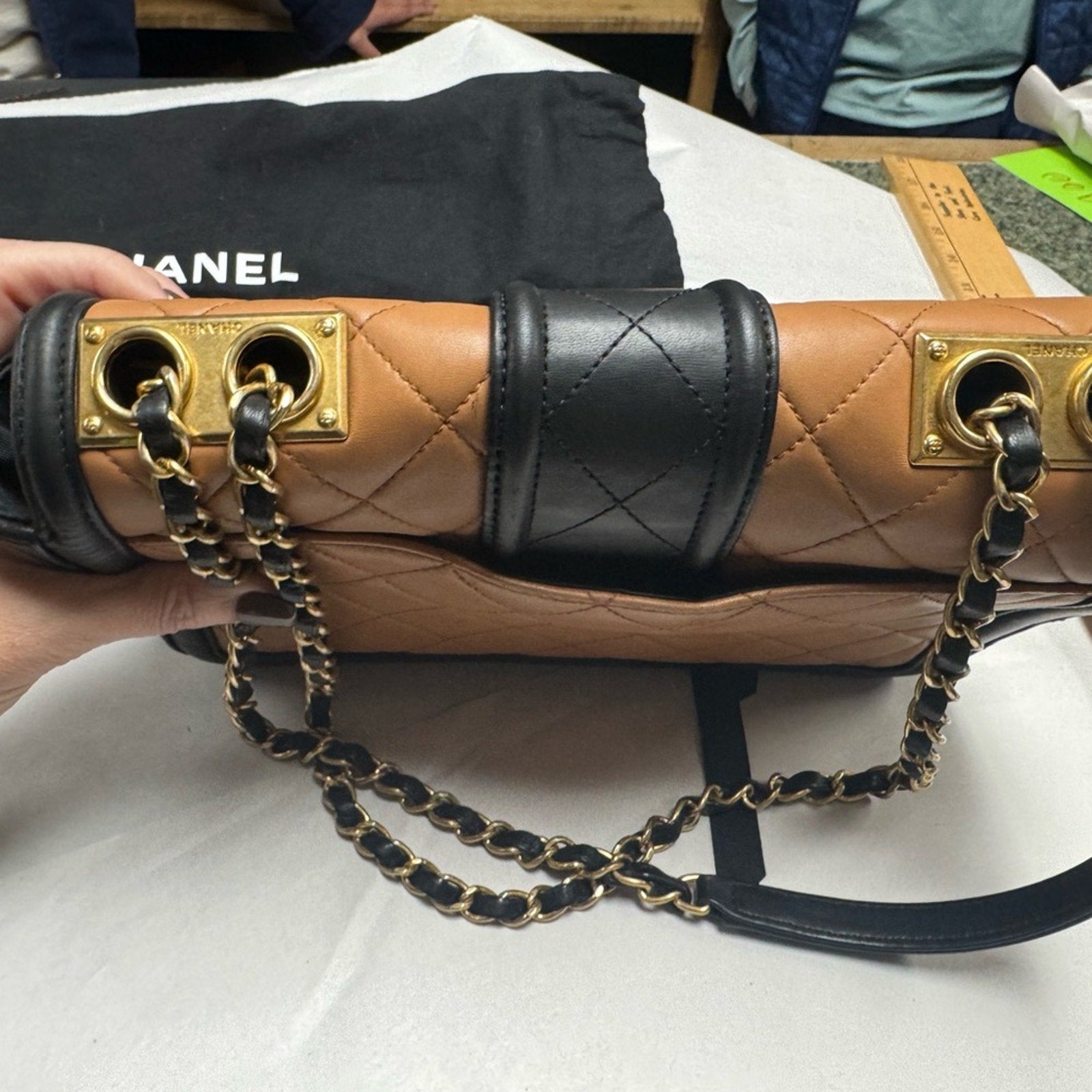 Chanel Black and Tan flap bag with gold hardware/adjustable strap/back pocket