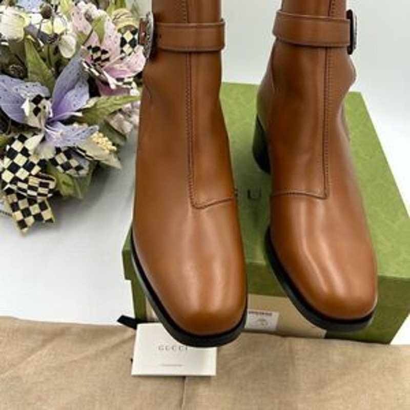 Men’s Gucci, leather ankle boots with buckle size 9 made in Italy