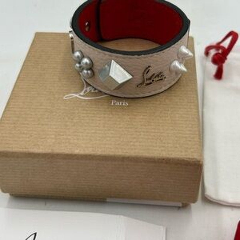 Christian Louboutin Paloma spike embellished leather bracelet. NWT.