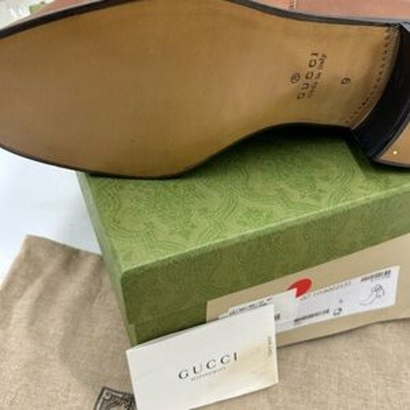Men’s Gucci, leather ankle boots with buckle size 9 made in Italy