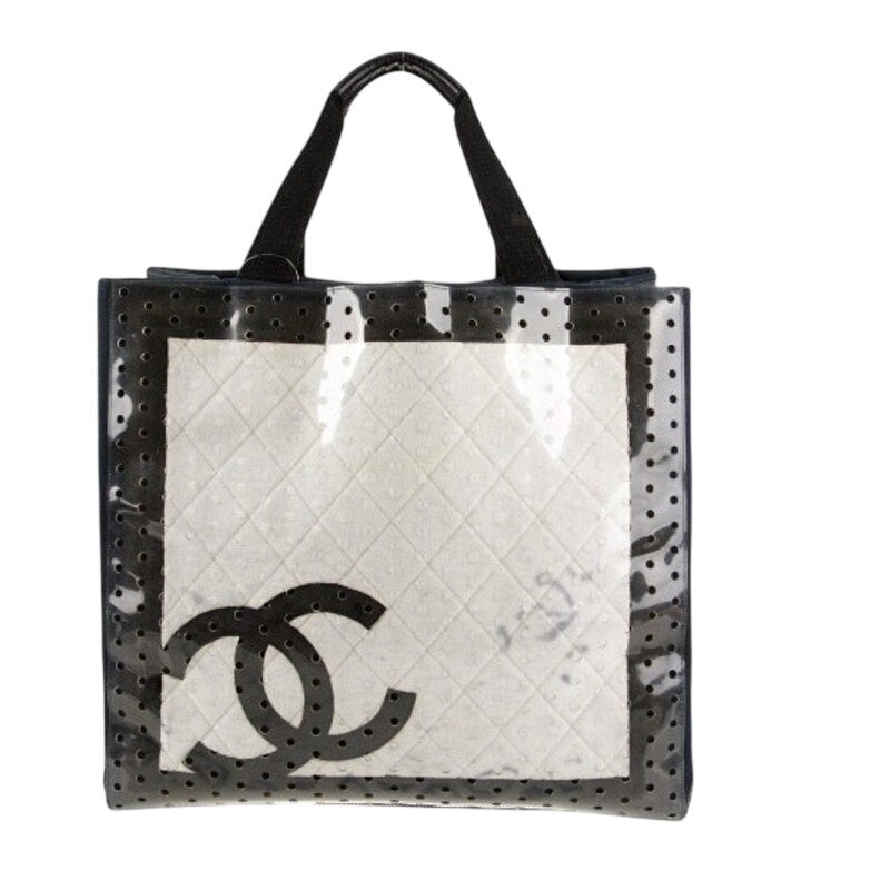 Chanel ENORMOUS tote, black + white fabric w/perforated pvc layer over material
