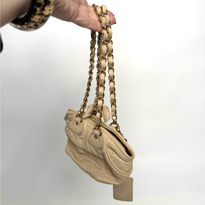 Dolce and Gabbana miniature leather bag with kiss lock, plaque and gold hardware