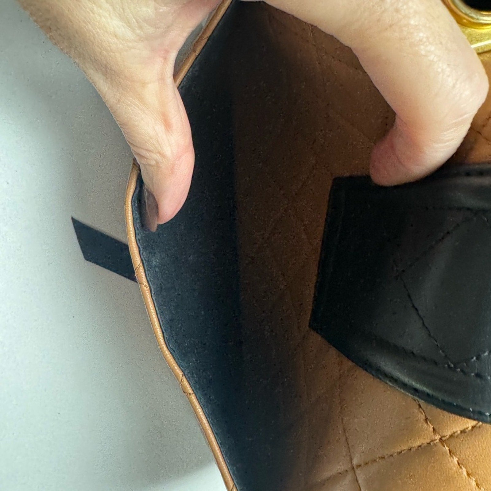 Chanel Black and Tan flap bag with gold hardware/adjustable strap/back pocket