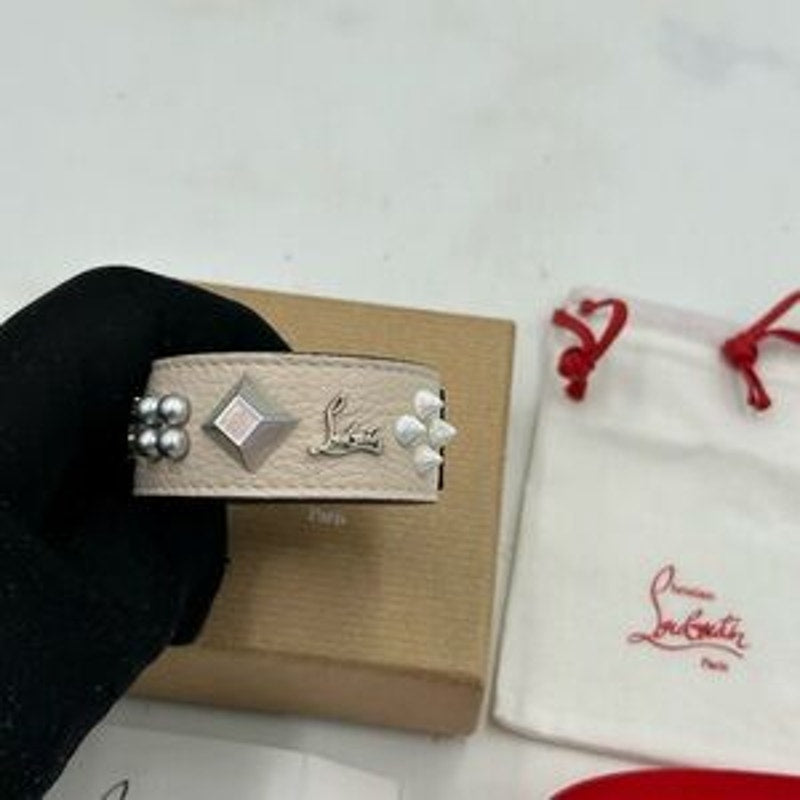 Christian Louboutin Paloma spike embellished leather bracelet. NWT.