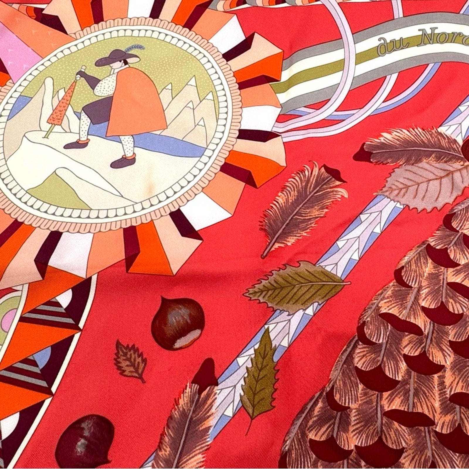 Hermes, silk scarf. The theme is the magic umbrella, coral colorway w/vignettes.